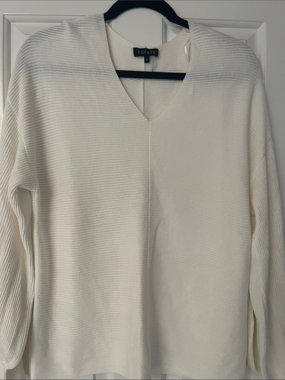 1. State Ivory V-Neck Ribbed Knit Sweater